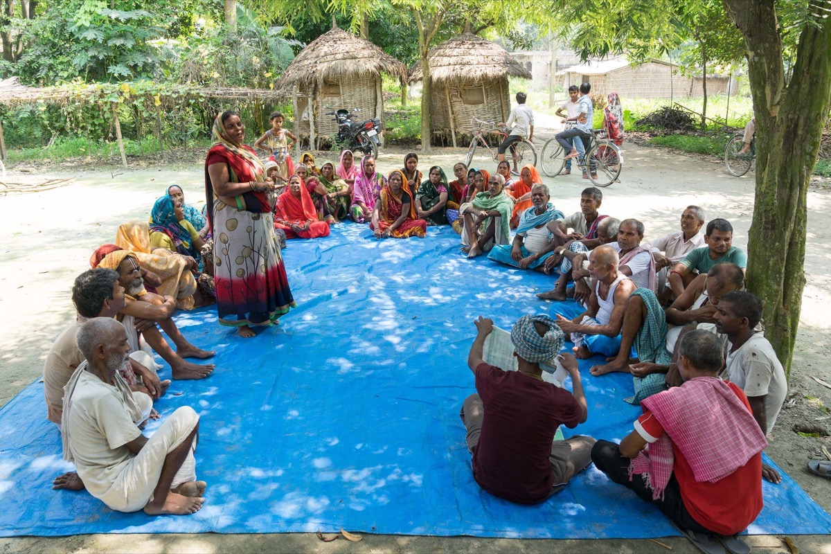 Villagers participating in a community meeting in Bihar — illustrative photograph